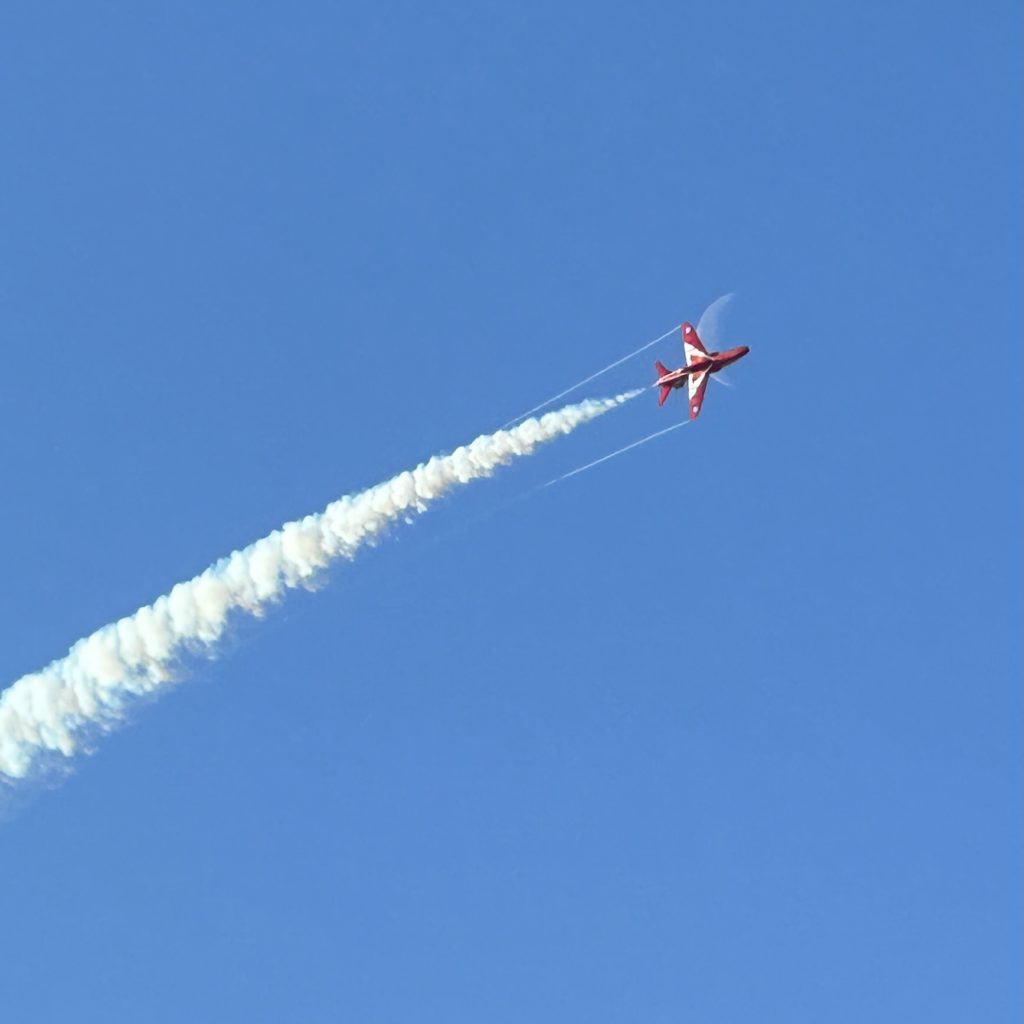 One Red Arrow and the moon