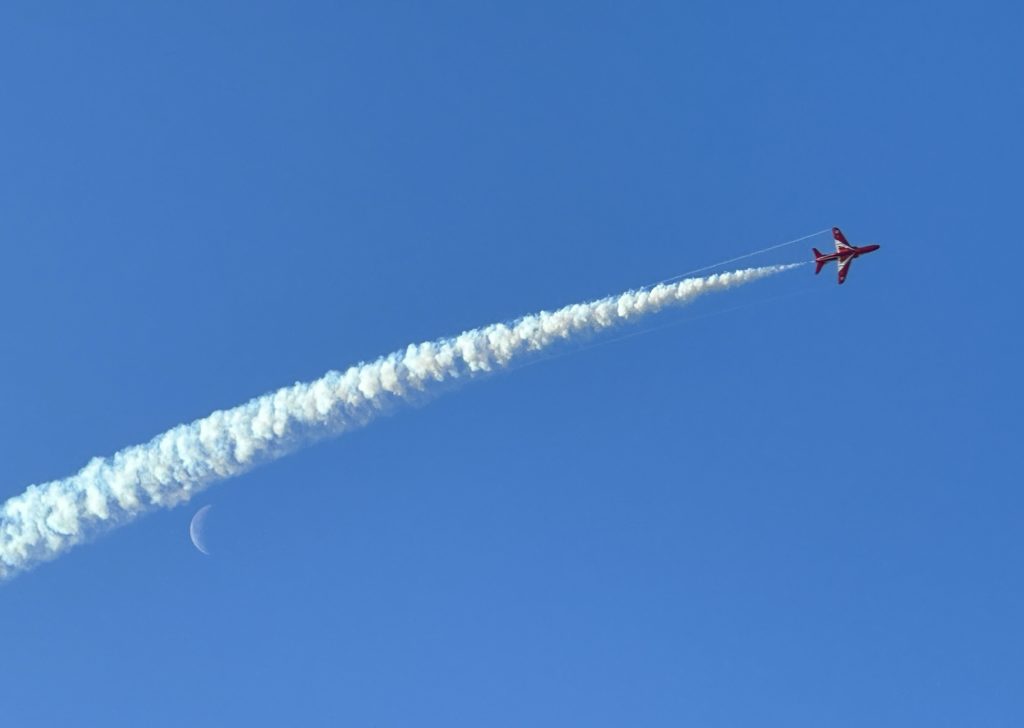 One Red Arrow and the moon